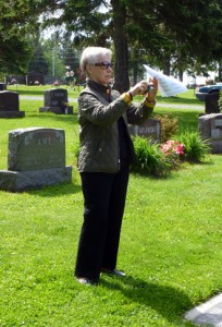 Kitt taking a picture at cemetary.
