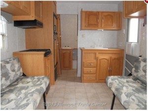 Toyhauler has a basic kitchen and bath.