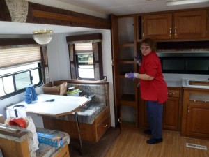 Pam is lining the drawers and cupboards with paper