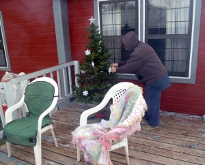 Pam decorating outdoor tree