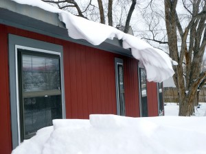 Snow cap above window