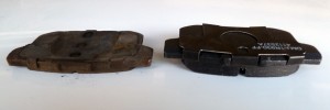 Rear pads (left) were getting pretty thin compared to new pads (right)