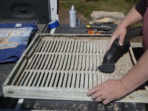 Cleaning the swamp cooler filter holders