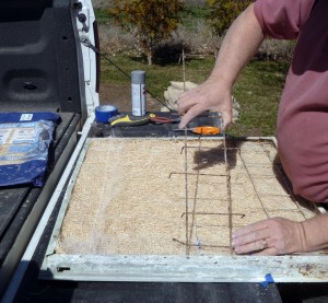 Installing the filter material holders in the filter frame