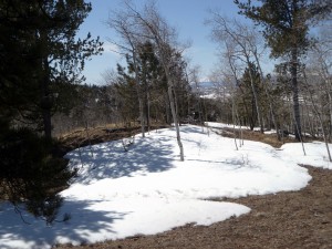 End of March snow in the saddle.