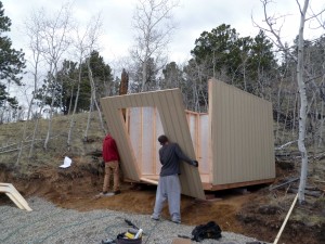 Sides up and front wall going into place