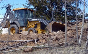 Using the bucket to move material