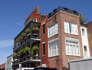 French Quarter is known for ornate wrought iron enclosed balconies