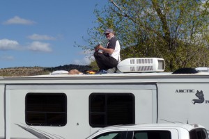 Jerry on the roof of The Box, replacing skylight