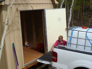 Pam helping me unload the cistern