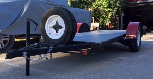 Profile shows off black frame and red fenders