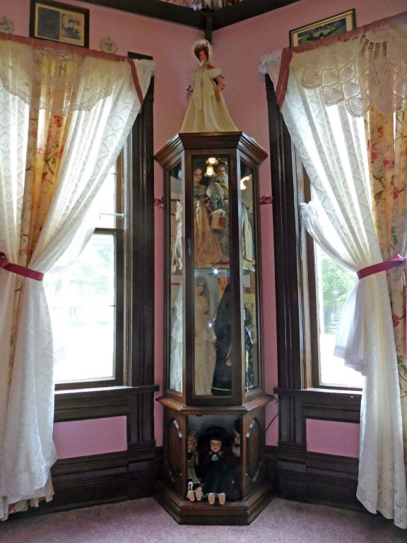 New doll display case in parlor bedroom