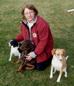 Pam with dogs Bru (left) Jo (center) and Blondie (right.)